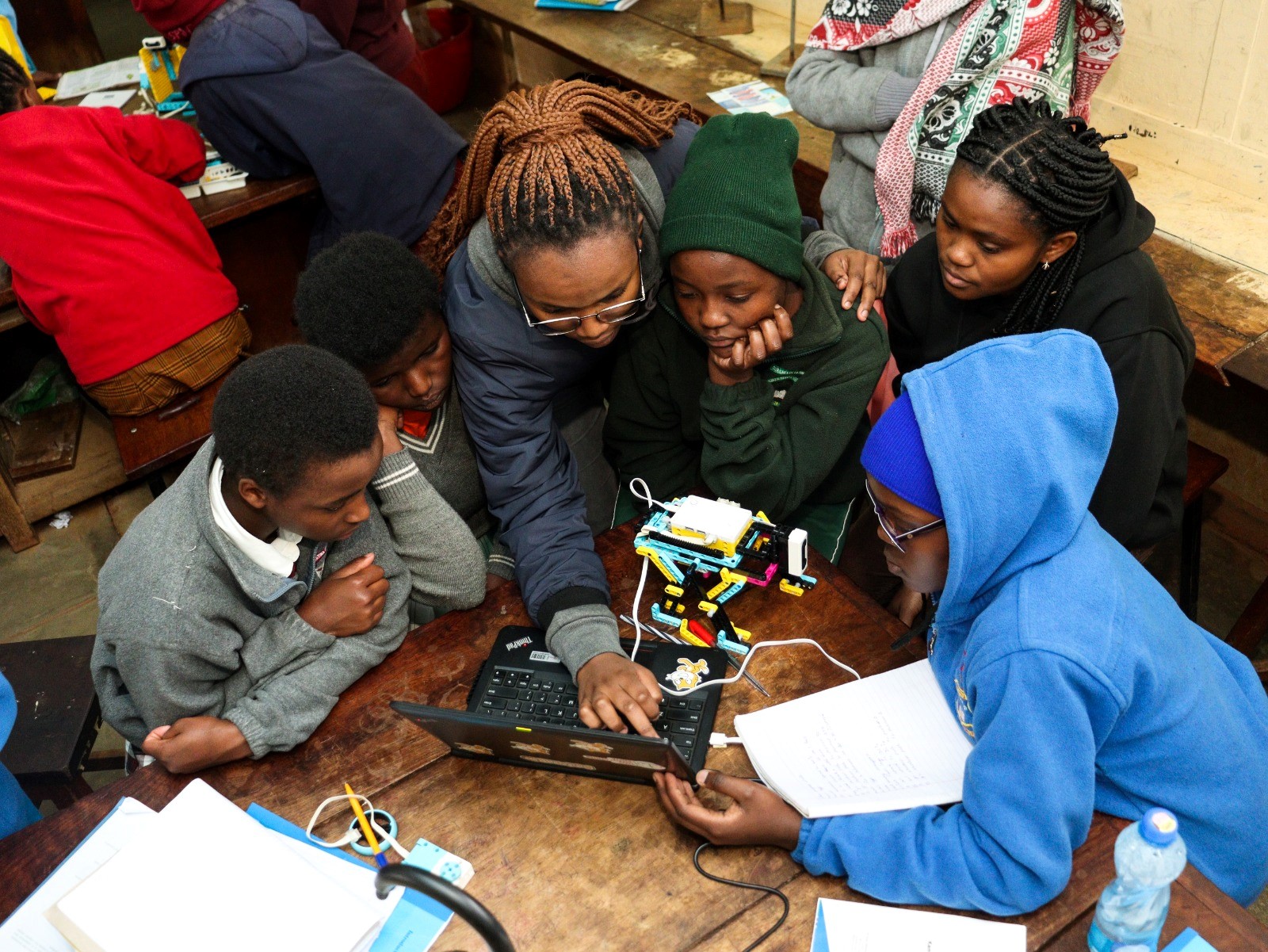 Young women in science practical learning Kenya